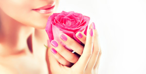 Girl keeps a gentle flower , manicure and Spa